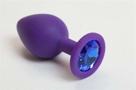 Фиолетовая силиконовая анальная пробка с голубым стразом - 8,2 см. - фото 394632