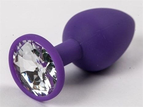 Фиолетовая силиконовая анальная пробка с прозрачным стразом - 7,1 см. - фото 394635