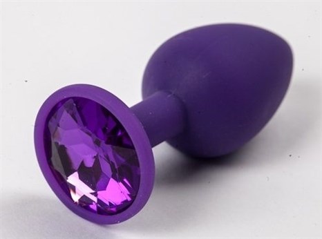Фиолетовая силиконовая анальная пробка с фиолетовым стразом - 7,1 см. - фото 394637