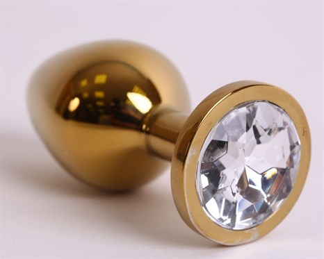 Золотистая анальная пробка с прозрачным кристаллом - 8,2 см. - фото 395355