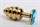 Золотистая ребристая анальная пробка с голубым стразом - 7,3 см. - фото 397814